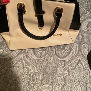 Nude black and red bag